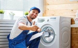 Repairs Washing Machine In Laundry